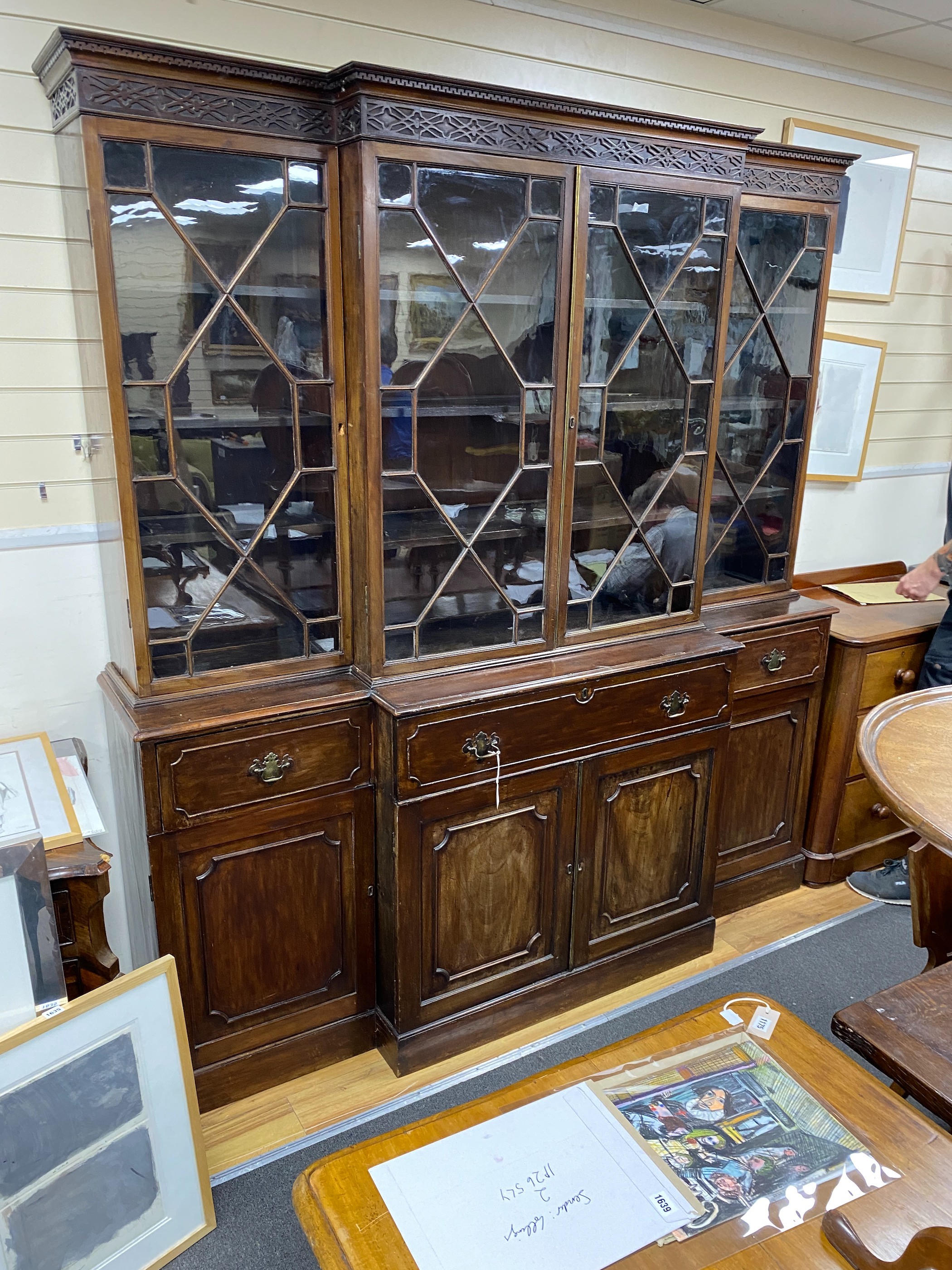 A George III style mahogany secretaire breakfront library bookcase, length 208cm, depth 50cm, height 224cm